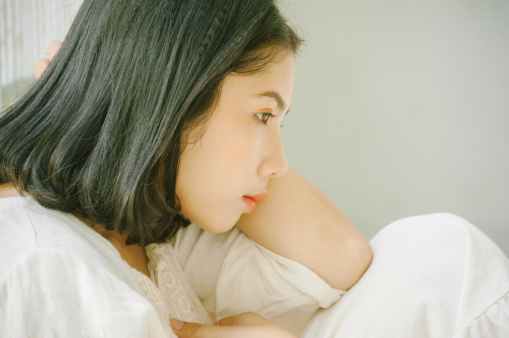 closeup photo of woman in white shirt and pants